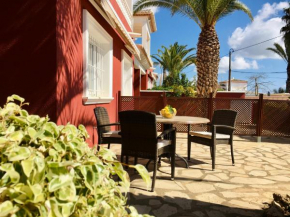 Apartamento adosado con jardín privado